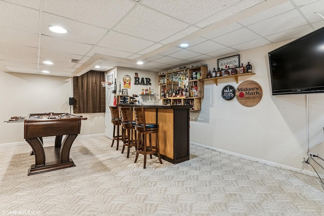 bar with carpet floors, a dry bar, baseboards, and recessed lighting