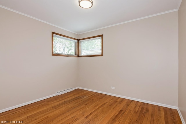 unfurnished room with light wood-style floors, baseboards, crown molding, and a baseboard radiator