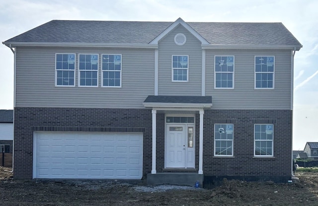 1755 Orchard Ln, New Lenox, IL 60451 - view of front of home featuring brick siding, dirt driveway, and a garage