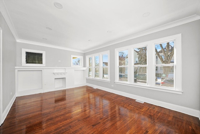 8045 S Escanaba Ave, Chicago, IL 60617 - unfurnished living room with baseboards, ornamental molding, wood finished floors, and visible vents