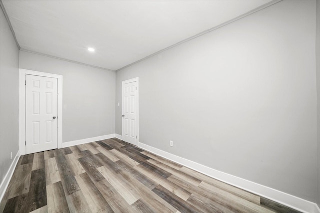 8045 S Escanaba Ave, Chicago, IL 60617 - empty room with recessed lighting, wood finished floors, crown molding, and baseboards