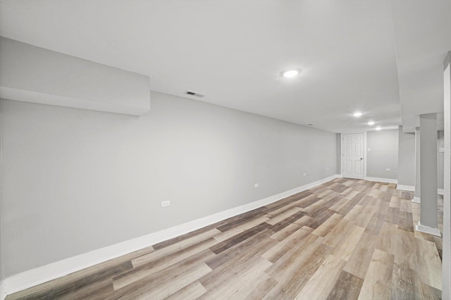 8045 S Escanaba Ave, Chicago, IL 60617 - finished basement featuring recessed lighting, light wood-type flooring, visible vents, and baseboards