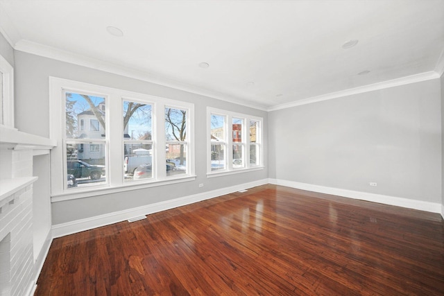 8045 S Escanaba Ave, Chicago, IL 60617 - empty room featuring a healthy amount of sunlight and ornamental molding