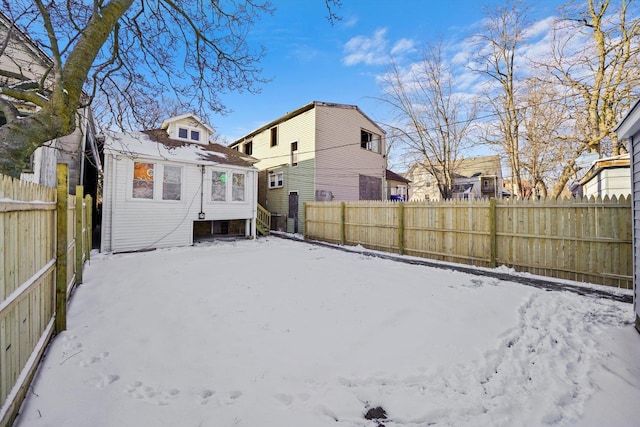 8045 S Escanaba Ave, Chicago, IL 60617 - snow covered house featuring fence private yard