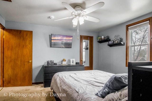 bedroom featuring carpet and a ceiling fan