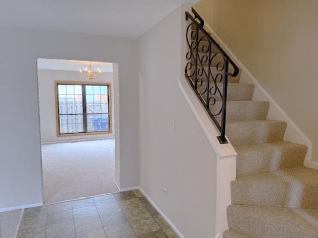4150 Brentwood Ln, Waukegan, IL 60087 - staircase with carpet flooring, a chandelier, baseboards, and tile patterned floors