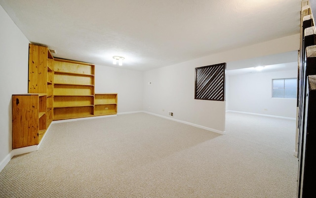 4150 Brentwood Ln, Waukegan, IL 60087 - below grade area featuring light carpet and baseboards