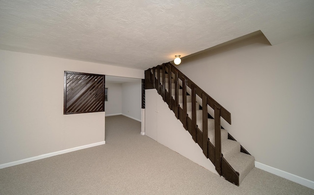 4150 Brentwood Ln, Waukegan, IL 60087 - staircase featuring carpet flooring, baseboards, and a textured ceiling