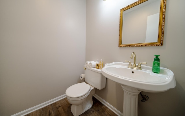 4150 Brentwood Ln, Waukegan, IL 60087 - bathroom featuring wood finished floors, baseboards, and toilet