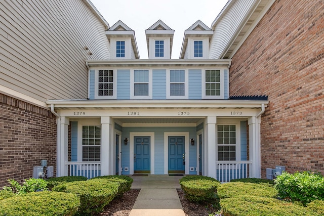 entrance to property with covered porch