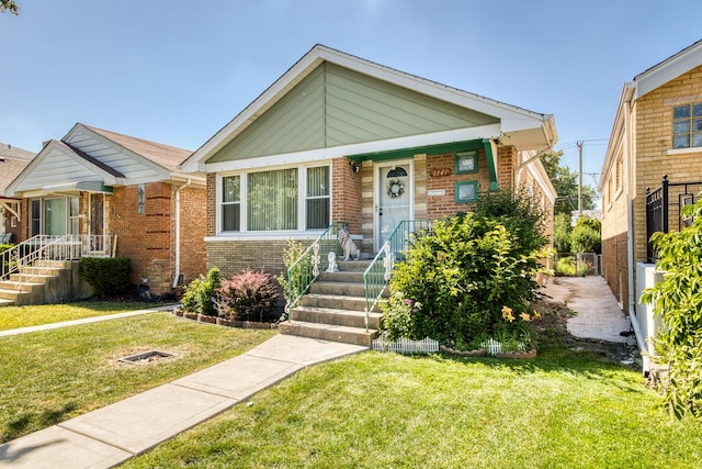 6141 W 35th St, Cicero, IL 60804 - view of front of home featuring brick siding and a front lawn