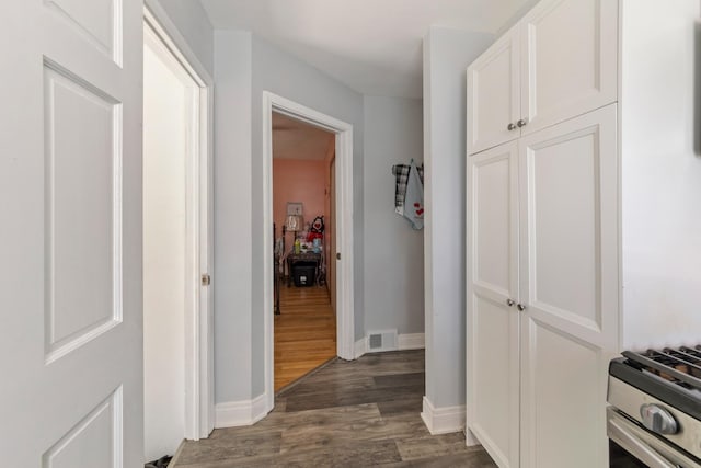 6141 W 35th St, Cicero, IL 60804 - hall with dark wood-style flooring and baseboards