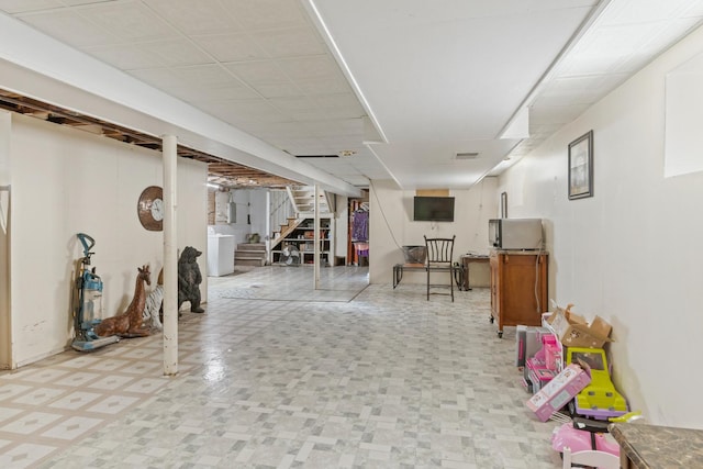 6141 W 35th St, Cicero, IL 60804 - finished basement featuring stairs, light flooring, and washer / clothes dryer