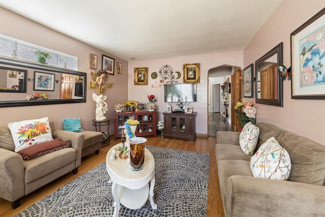 6141 W 35th St, Cicero, IL 60804 - living area featuring arched walkways and wood finished floors