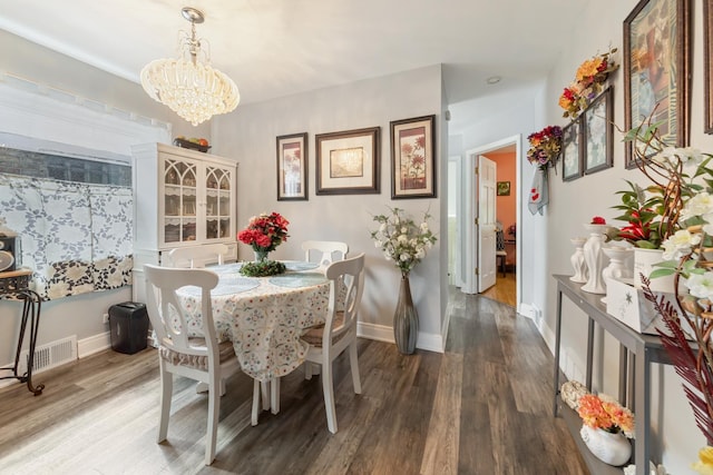 6141 W 35th St, Cicero, IL 60804 - dining room with a chandelier and wood finished floors