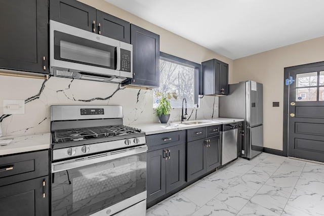 292 W 15th Pl, Chicago Heights, IL 60411 - kitchen with marble finish floor, light stone countertops, tasteful backsplash, a sink, and stainless steel appliances