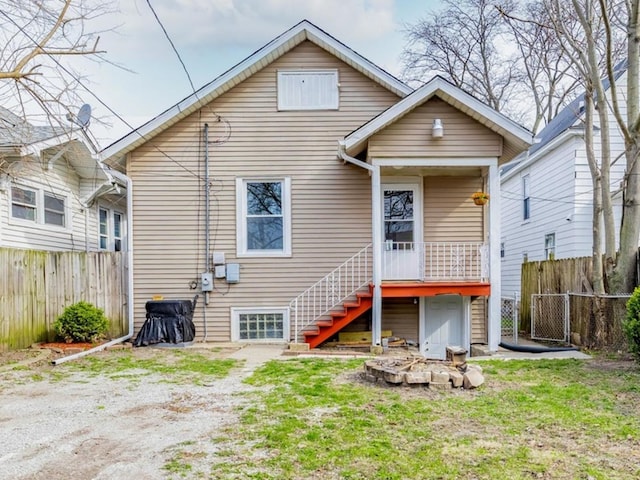 292 W 15th Pl, Chicago Heights, IL 60411 - rear view of house featuring fence and stairs