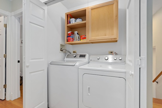 3727 N Paulina St, Chicago, IL 60613 - washroom with washing machine and clothes dryer, cabinet space, and light wood-style flooring