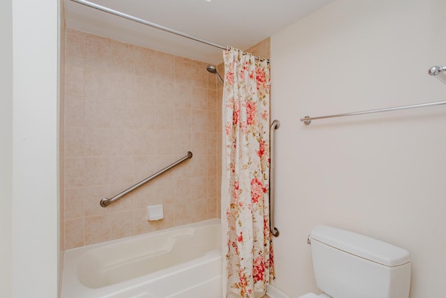 full bathroom featuring shower / bath combination with curtain and toilet