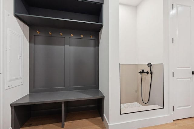 mudroom with wood finished floors