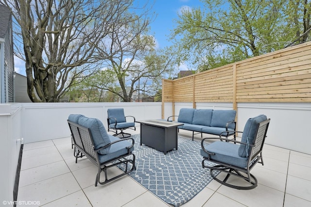 view of patio with outdoor lounge area and fence