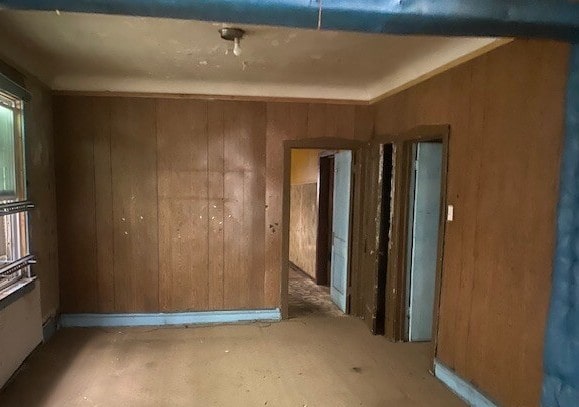6954 S Honore St, Chicago, IL 60636 - unfurnished room featuring wooden walls and baseboards