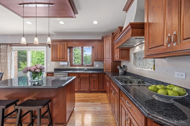 325 Bonnie Brae Ave, Itasca, IL 60143 - kitchen featuring custom range hood, stainless steel appliances, brown cabinets, and recessed lighting
