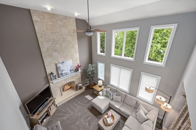 325 Bonnie Brae Ave, Itasca, IL 60143 - carpeted living room featuring a fireplace, ceiling fan, and a high ceiling