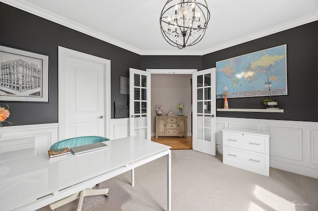 325 Bonnie Brae Ave, Itasca, IL 60143 - home office featuring french doors, a chandelier, ornamental molding, a wainscoted wall, and light carpet