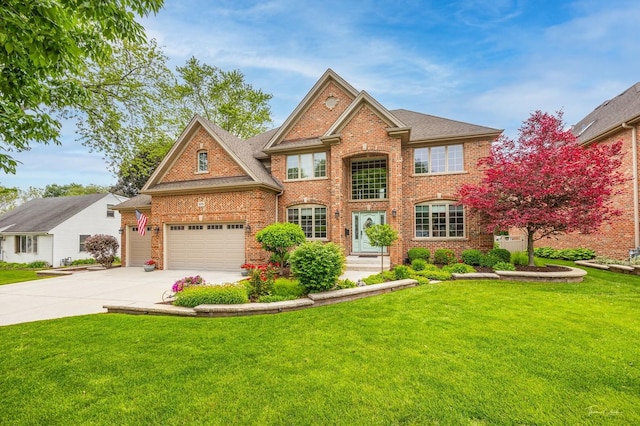 325 Bonnie Brae Ave, Itasca, IL 60143 - view of front facade with brick siding, driveway, and a front lawn