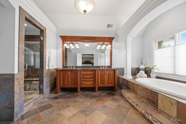 325 Bonnie Brae Ave, Itasca, IL 60143 - full bath with ornate columns, stone tile flooring, double vanity, a stall shower, and a garden tub