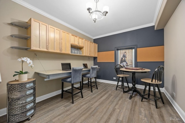 325 Bonnie Brae Ave, Itasca, IL 60143 - home office featuring built in study area, wood finished floors, a chandelier, and crown molding
