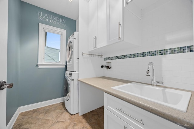 325 Bonnie Brae Ave, Itasca, IL 60143 - laundry room with stacked washer / dryer and cabinet space