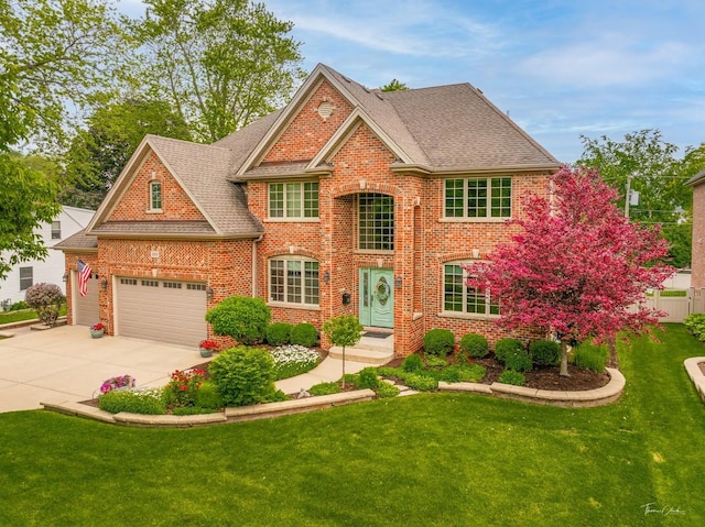 325 Bonnie Brae Ave, Itasca, IL 60143 - view of front of property with brick siding, concrete driveway, a shingled roof, and an attached garage