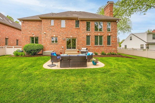 325 Bonnie Brae Ave, Itasca, IL 60143 - rear view of house featuring a chimney, a patio area, brick siding, and a fenced backyard