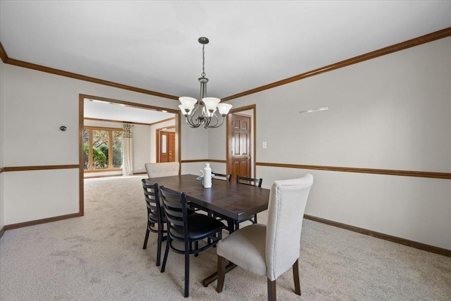 931 Sanctuary Ln, Naperville, IL 60540 - dining area featuring an inviting chandelier, crown molding, carpet flooring, and baseboards