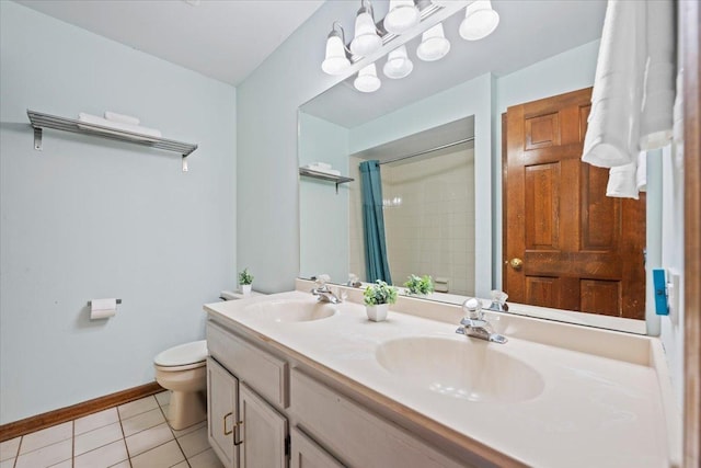931 Sanctuary Ln, Naperville, IL 60540 - bathroom featuring toilet, a sink, tile patterned floors, and baseboards
