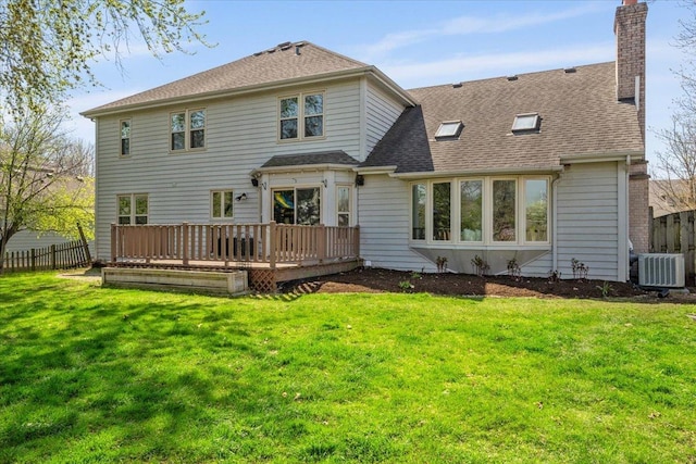 931 Sanctuary Ln, Naperville, IL 60540 - rear view of house with fence, roof with shingles, a chimney, and a wooden deck