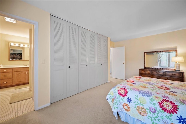 1053 W Ogden Ave Unit 350, Naperville, IL 60563 - bedroom with a closet, light carpet, and baseboards