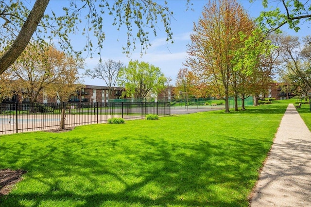 1053 W Ogden Ave Unit 350, Naperville, IL 60563 - view of community with a lawn and fence