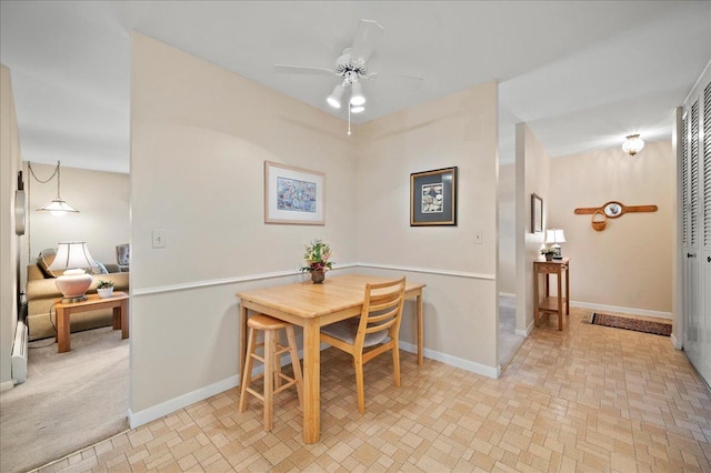1053 W Ogden Ave Unit 350, Naperville, IL 60563 - dining room featuring ceiling fan and baseboards