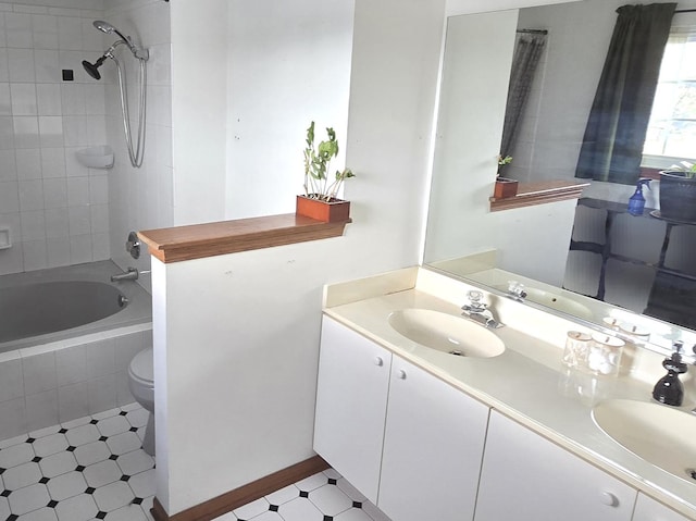 210 Braxton Ct, Grayslake, IL 60030 - bathroom with tiled shower / bath combo, a sink, double vanity, and toilet