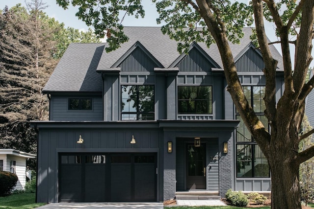 905 N Webster St, Naperville, IL 60563 - modern farmhouse style home featuring board and batten siding, roof with shingles, a garage, and driveway