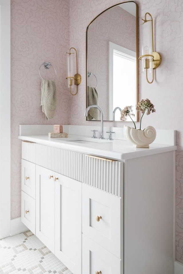 905 N Webster St, Naperville, IL 60563 - bathroom featuring wallpapered walls and vanity