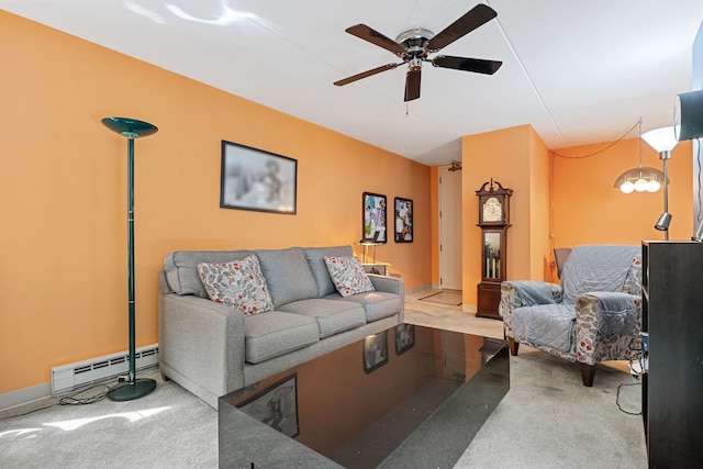 330 W Miner St Unit 1B, Arlington Heights, IL 60005 - living room featuring baseboard heating, a ceiling fan, and carpet flooring