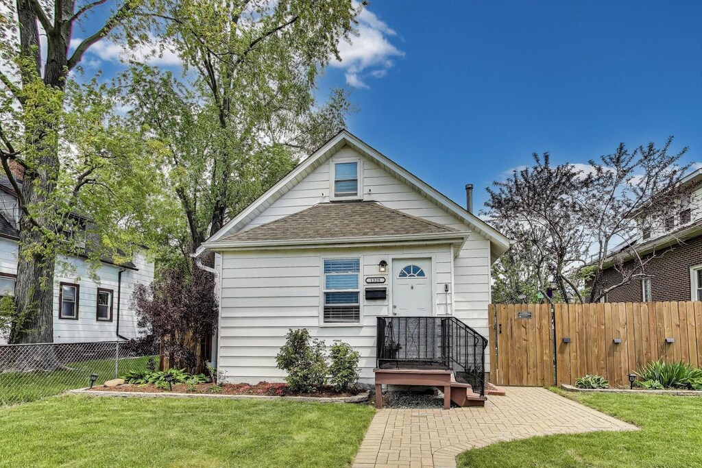 1325 Lincoln St, North Chicago, IL 60064 - view of front facade with roof with shingles