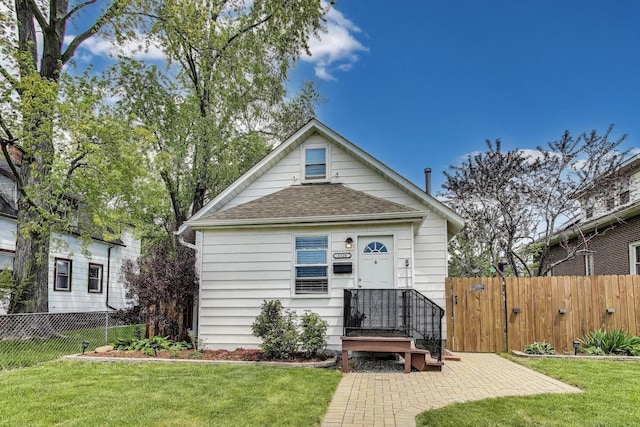 1325 Lincoln St, North Chicago, IL 60064 - view of front facade with roof with shingles