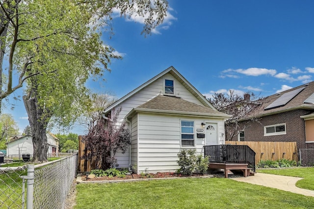 1325 Lincoln St, North Chicago, IL 60064 - view of front of property featuring a deck and roof with shingles