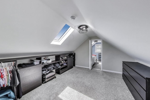 1325 Lincoln St, North Chicago, IL 60064 - bonus room with vaulted ceiling, a skylight, carpet, and baseboards