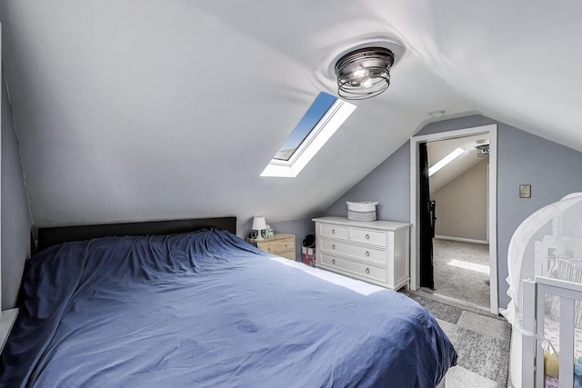1325 Lincoln St, North Chicago, IL 60064 - carpeted bedroom featuring a skylight and vaulted ceiling